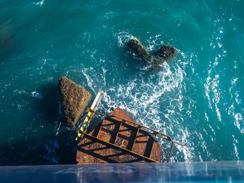 High angle view of water splashing in sea