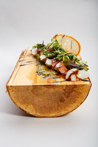 High angle view of food on table against white background