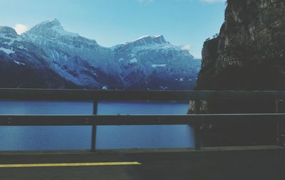 Scenic view of snowcapped mountains against sky