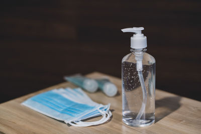 Close-up of glass bottle on table