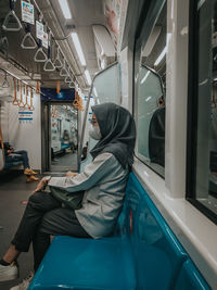 Man sitting in train