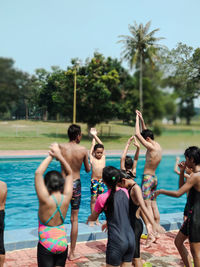 Group of people in swimming pool