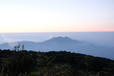 Scenic view of mountains against sky during sunset