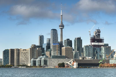 View of buildings against cloudy sky