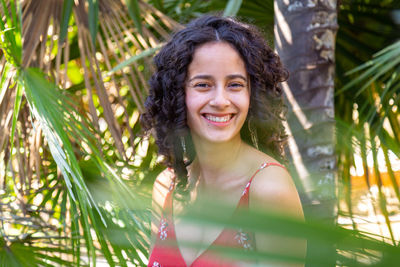 Portrait of young woman looking away