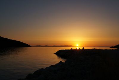 Scenic view of sea at sunset