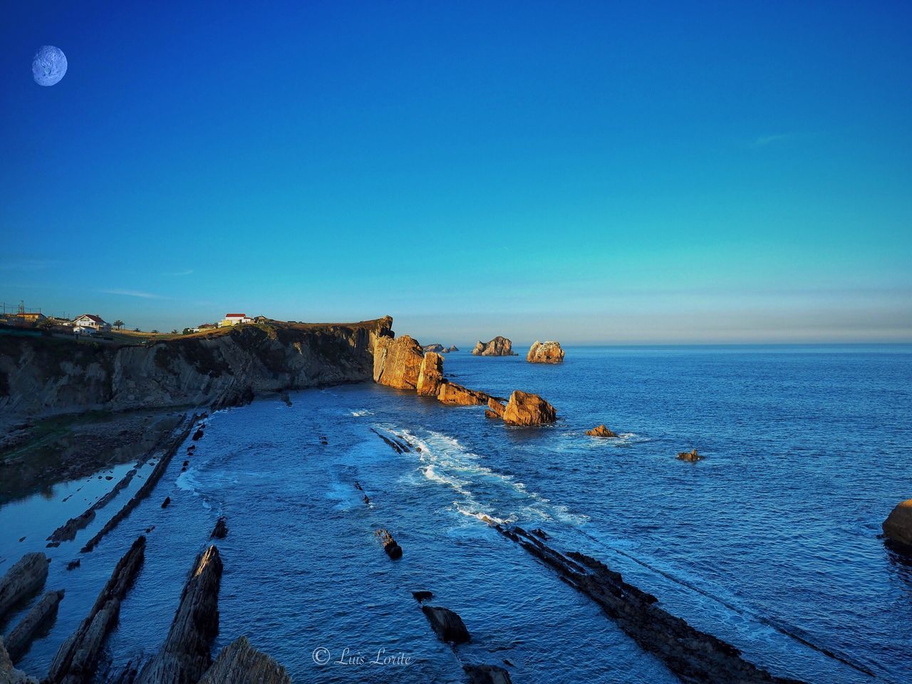 blue, cold temperature, winter, snow, sea, beauty in nature, nature, sky, clear sky, scenics, outdoors, water, no people, tranquility, tranquil scene, horizon over water, day, beach