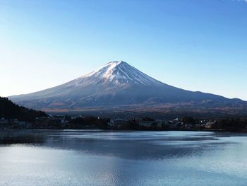 Scenic view of mountains against clear blue sky