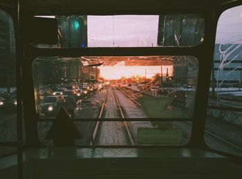 Train at railroad station platform against sky