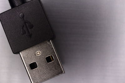 Cropped image of usb cable on gray background