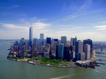 Panoramic view of city and buildings against sky