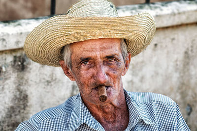 Portrait of man wearing hat