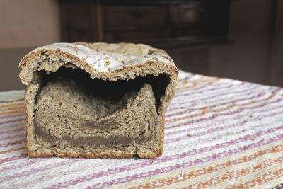 Slack baked homemade loaf of wholewheat bread