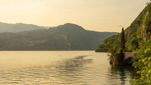 Scenic view of lake against sky during sunset