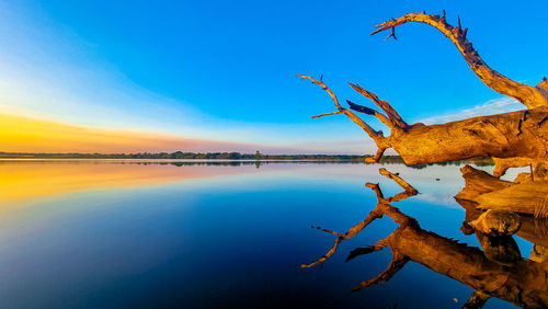 Scenic view of sea against sky during sunset