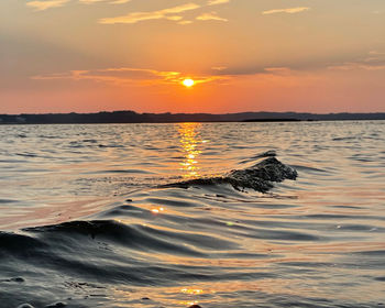 Scenic view of sea against sky during sunset