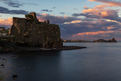 Scenic view of sea against sky during sunset