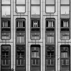 Full frame shot of building, reflection of old building in modern facade