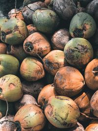 Full frame shot of coconuts for sale at market