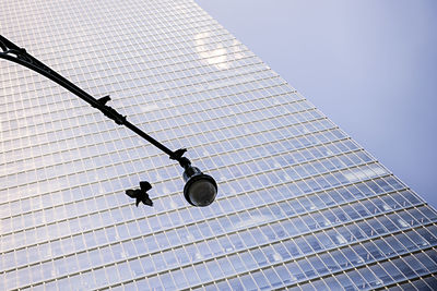 Low angle view of skyscraper against sky