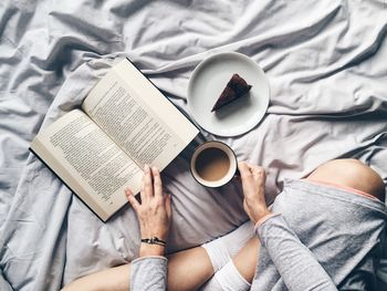 Midsection of man holding hair
