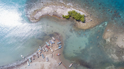 High angle view of boats moored on shore at beach