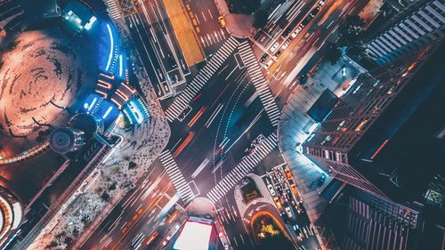 Low angle view of illuminated city at night