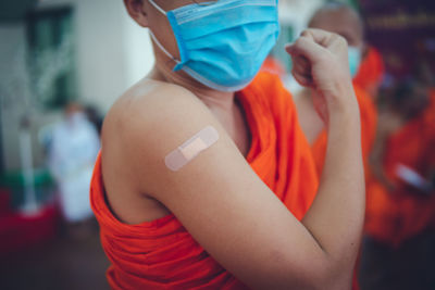 Close-up of woman holding hands