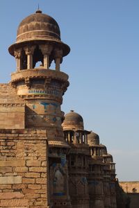 Low angle view of old building against sky