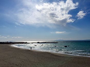 Scenic view of beach against sky