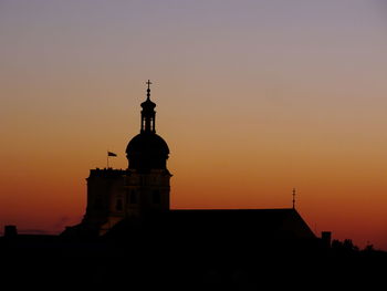 Low angle view of building at sunset