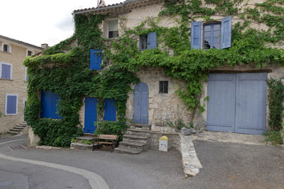 Street by buildings in town