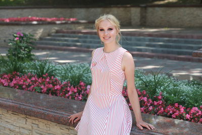 Portrait of woman wearing striped top