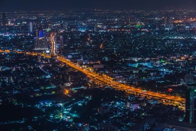 High angle view of illuminated city at night