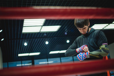 Man standing in boxing ring