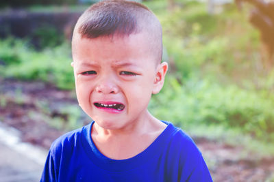 Portrait of boy crying