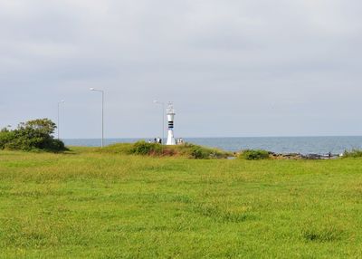 Scenic view of field against sky. lighthouse in ordu, turkey.