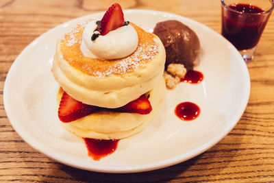 Close-up of dessert served on table