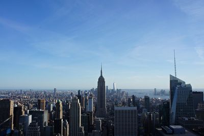 Modern buildings in city against sky