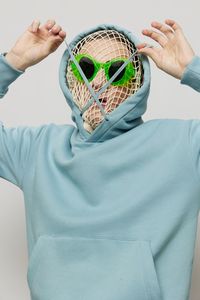 Midsection of woman wearing mask