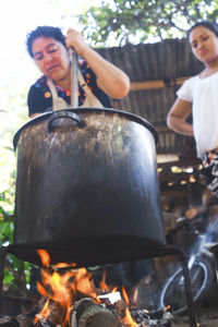 Full length of man on barbecue grill