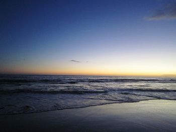 Scenic view of sea against sky at sunset