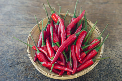 High angle view of red chili peppers on table