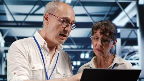 Young man using digital tablet in office