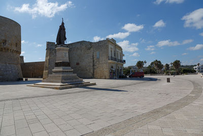 Exterior of historic building against sky in city