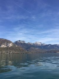 Scenic view of lake against blue sky