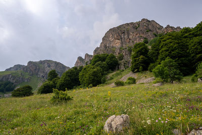 Scenic view of rocky mountains against sky