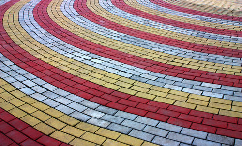 Beautiful colored paving stones of the road.
