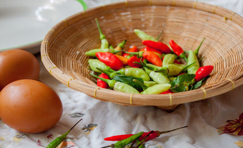 Close-up of vegetables in basket on table