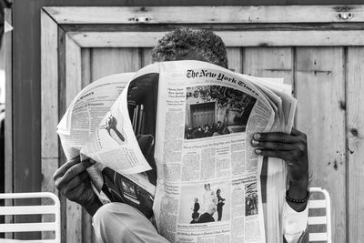 Close-up of man using mobile phone